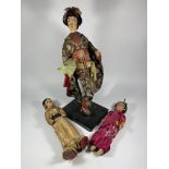 THREE 1970'S CHINESE DOLL FIGURES INCLDING ONE ON STAND, HEIGHT OF TALLEST 42CM