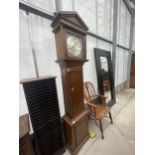 A REPRODUCTION OAK LONGCASE CLOCK WITH BRASS FACE AND THREE BRASS WEIGHTS