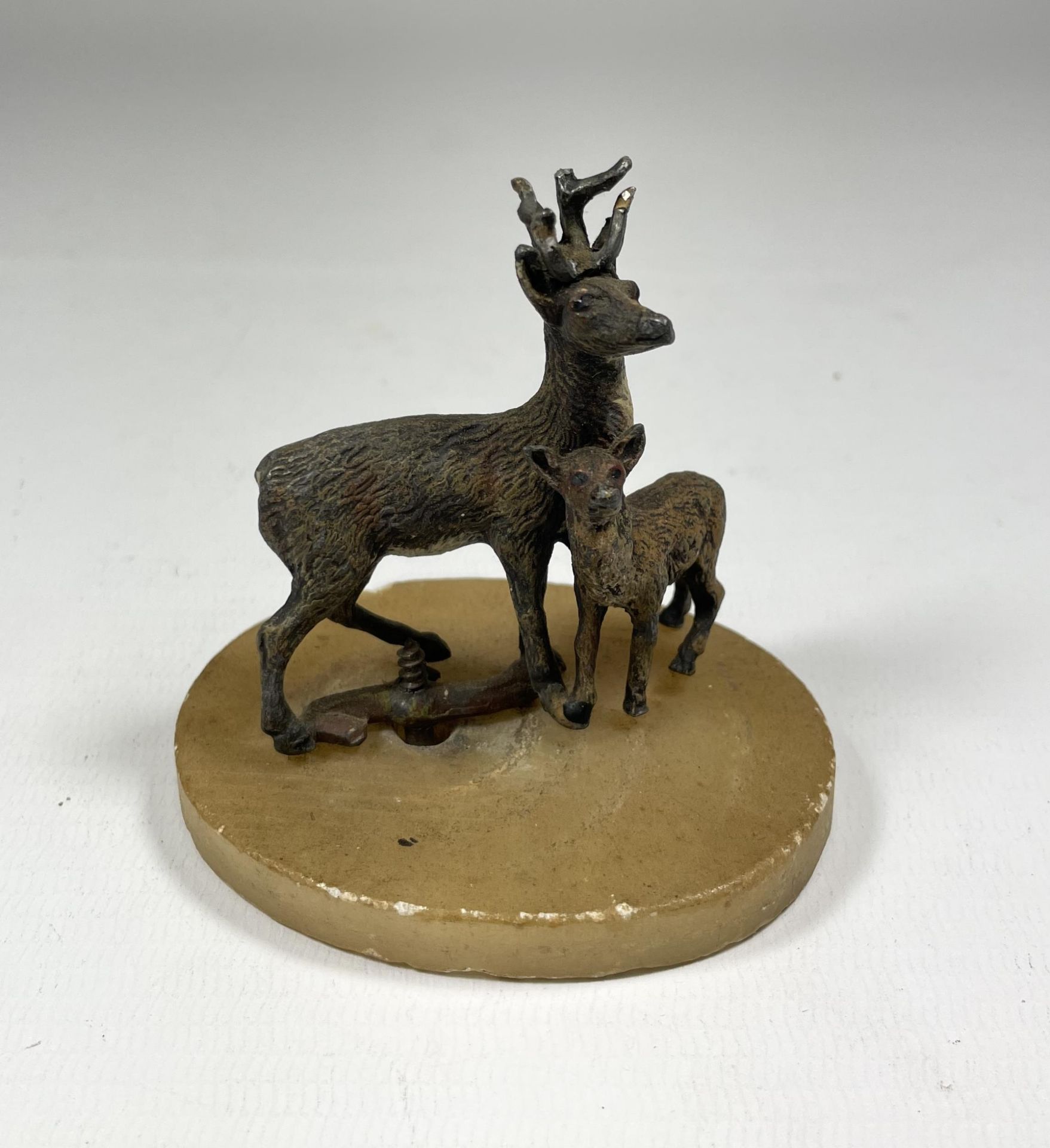 A VINTAGE MINIATURE AUSTRIAN COLD PAINTED SPELTER MODEL OF A DEER & FOAL