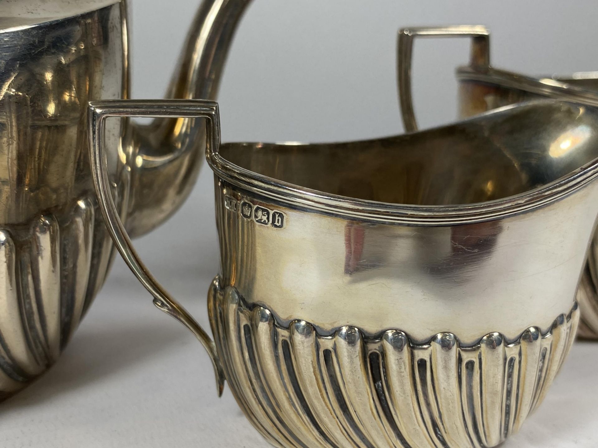 A VICTORIAN SILVER BACHELORS THREE PIECE TEA SET, HALLMARKS FOR SHEFFIELD, 1895, MAKERS HARRISON - Image 3 of 4