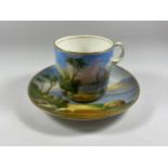 A 19TH CENTURY HAND PAINTED PORCELAIN CUP & SAUCER, WITH RED WINGS MARK TO BASE, CUP HEIGHT 8CM