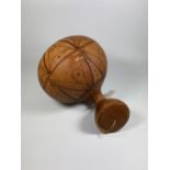 A VINTAGE TRIBAL WOODEN POPPY SEED GOURD