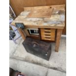 A SMALL WOODEN WORK BENCH WITH WOOD VICE AND A JOINERS CHEST