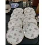 A QUANTITY OF HANDPAINTED CABINET PLATES DWITH FLORAL DESIGN AND GILT EDGES