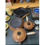 FOUR LE CREUSET PANS TO INCLUDE A GRIDDLE, FRYING PAN AND TWO SAUCEPANS