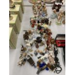 A LARGE QUANTITY OF MINIATURE ITEMS TO INCLUDE CERAMIC FIGURES, ANIMALS, ETC