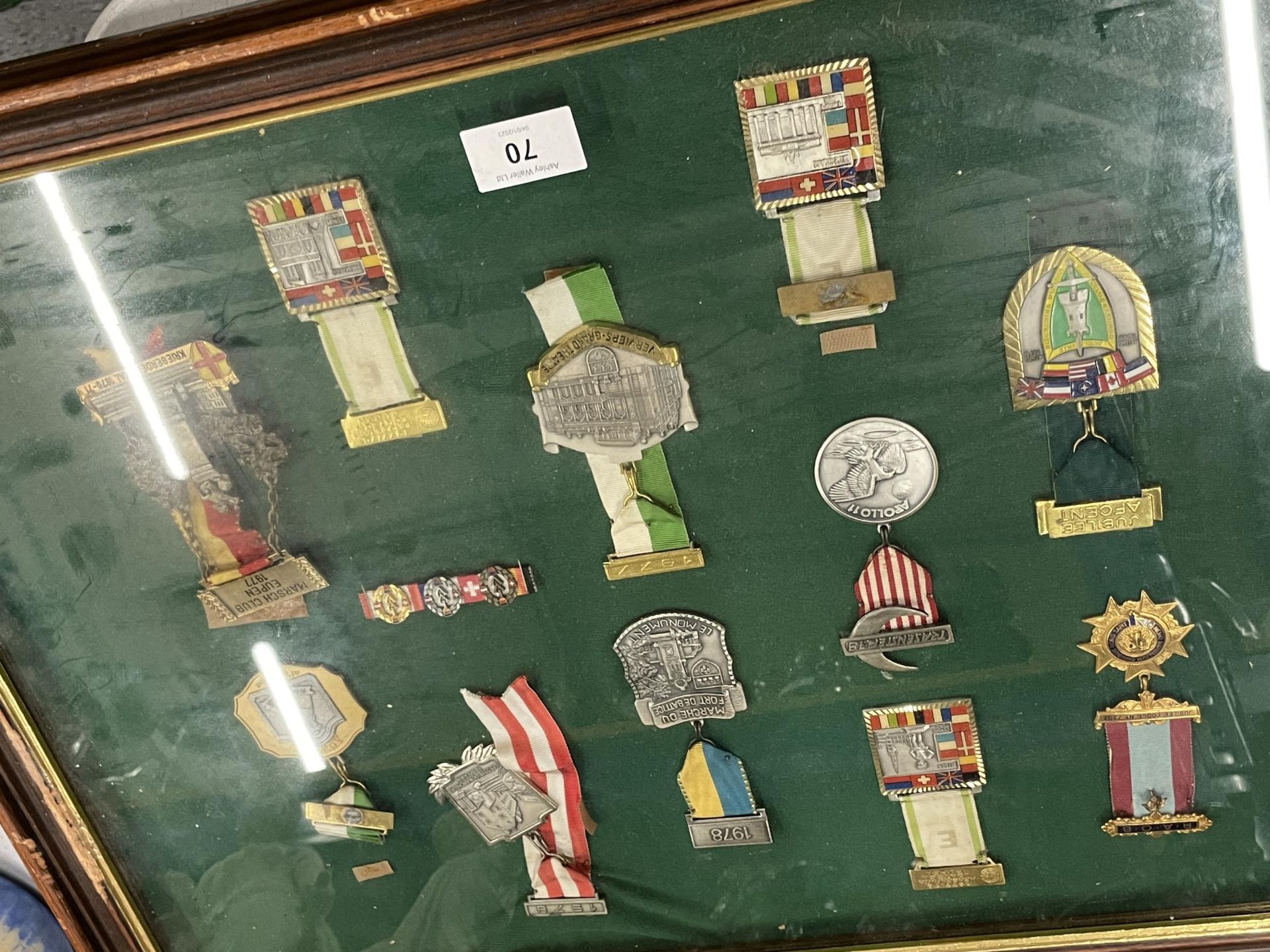 A WOODEN AND GLASS DISPLAY CASE CONTAINING ASSORTED MILITARY MEDALS - Image 2 of 2