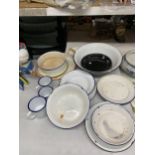 A LARGE QUANTITY OF VINTAGE ENAMEL ITEMS TO INCLUDE A LARGE WASHBOWL, PLATES, MUGS, A TRAY, ETC