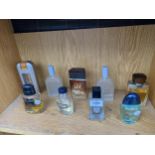 AN ASSORTMENT OF GENTS AFTERSHAVE