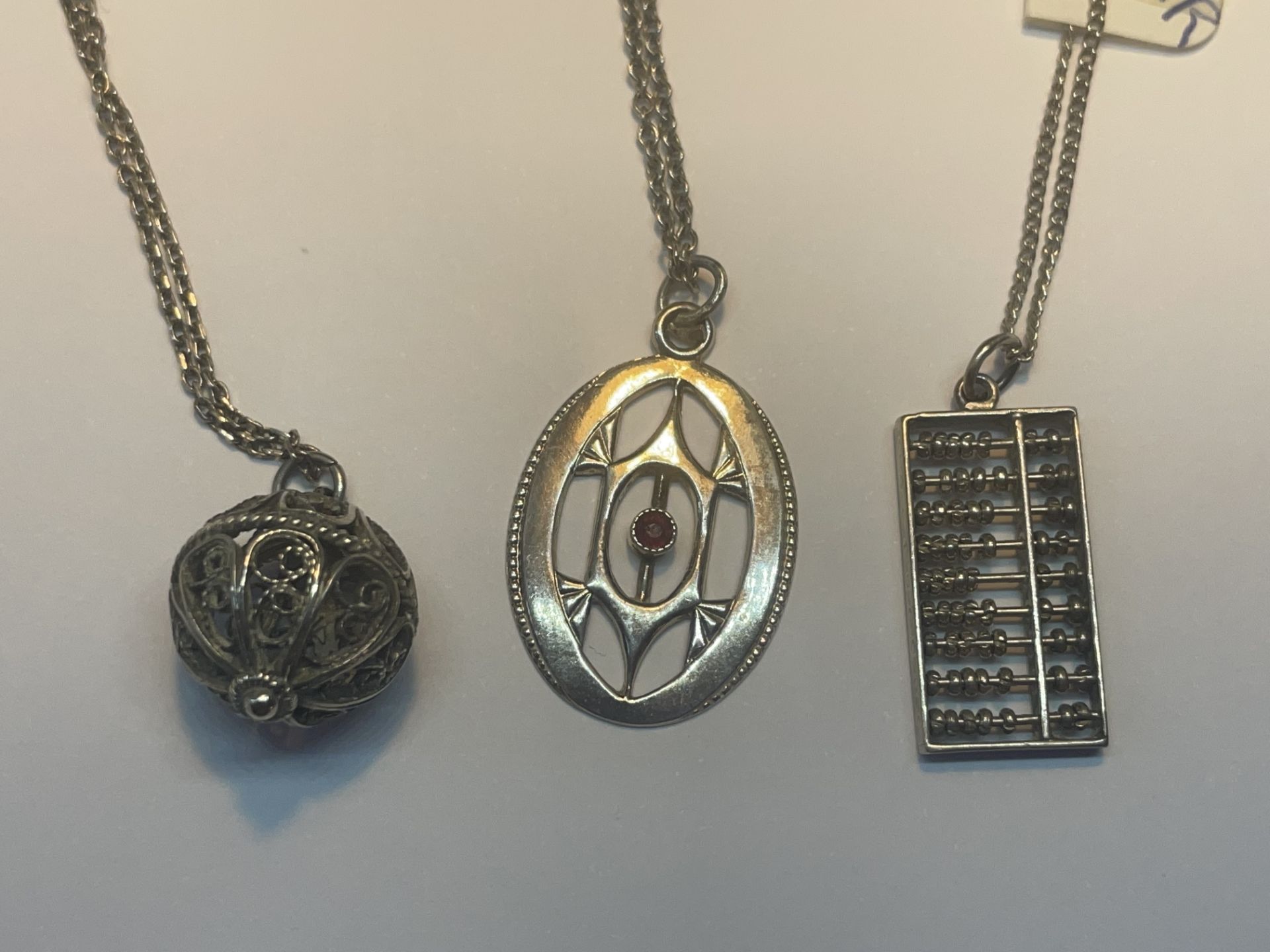SIX SILVER ITEMS TO INCLUDE THREE PENDANTS ON CHAINS, A RING WITH BLUE STONE AND TWO PAIRS OF - Image 2 of 4