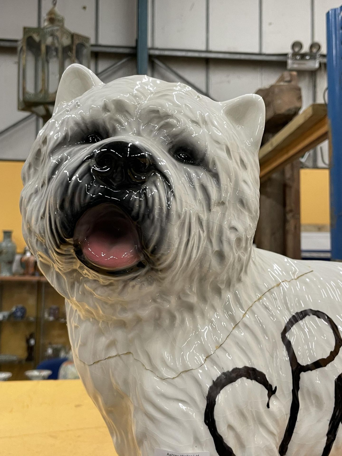 A LARGE CERAMIC MODEL OF A DOG WITH ADDED SPRATTS DESIGN, HEIGHT 43CM A/F - Image 2 of 2