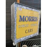 A SQUARE ILLUMINATED 'MORRIS' SIGN