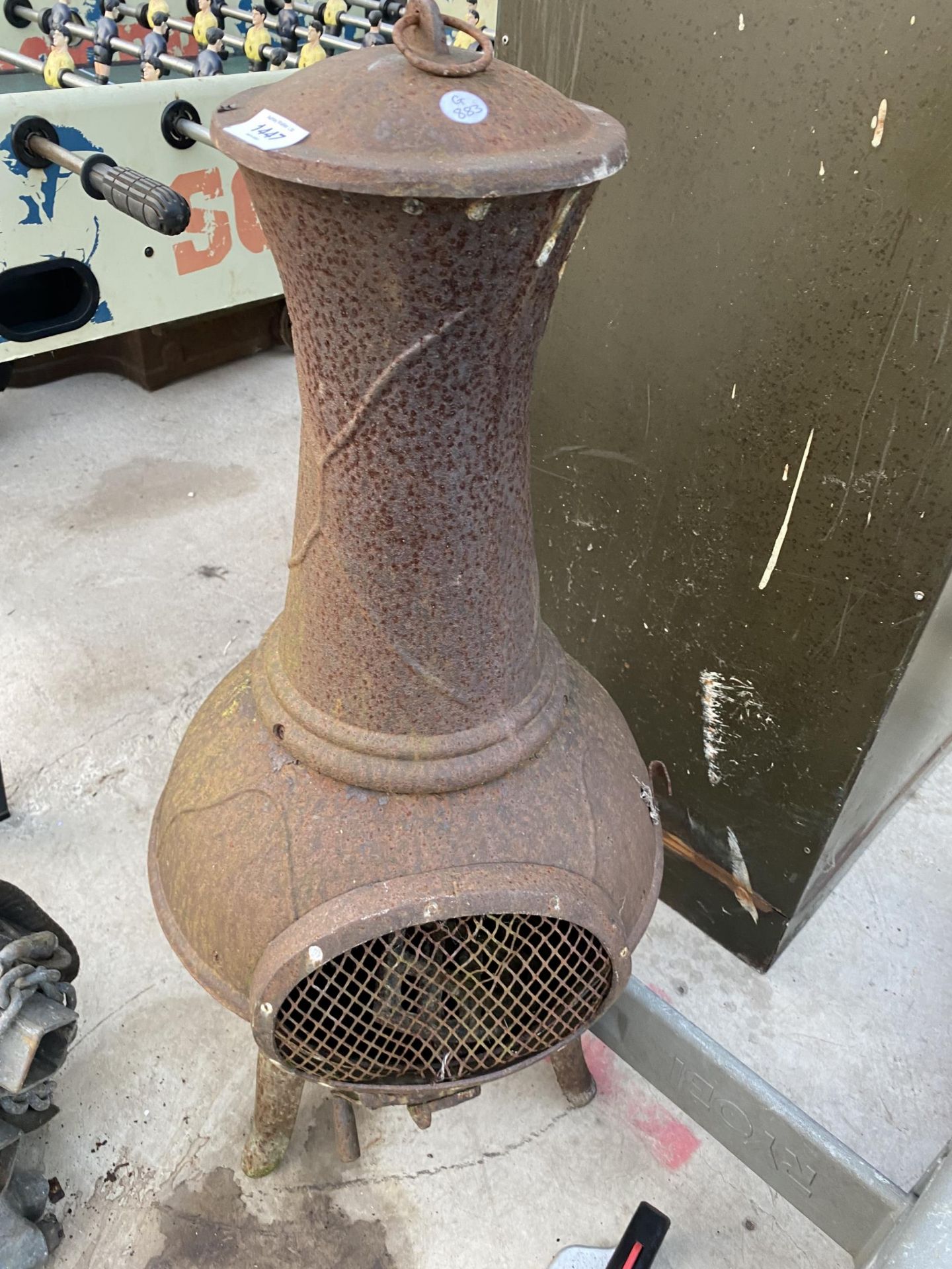 A CAST IRON GARDEN CHIMENEA