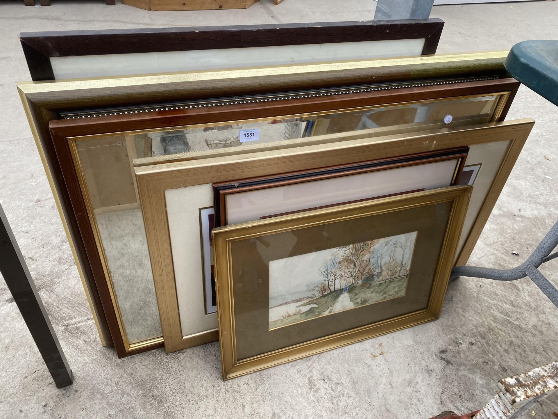 AN ASSORTMENT OF FRAMED PRINTS AND MIRRORS