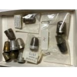 A BOX OF ASSORTED THIMBLES TO INCLUDE FIVE SILVER EXAMPLES - ONE WITH LICHFIELD CATHEDRAL DESIGN