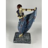 A LARGE FIGURE OF A 1920'S LADY ON A MARBLE EFFECT PLINTH HEIGHT 41CM