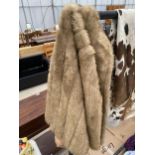 A LADIES FUR COAT