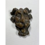 AN UNUSUAL BRONZE GOTHIC PAPERWEIGHT, UNSIGNED