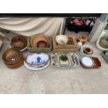 AN ASSORTMENT OF ITEMS TO INCLUDE A LARGE PESTLE AND MORTER, WICKER BASKETS AND TUREENS ETC