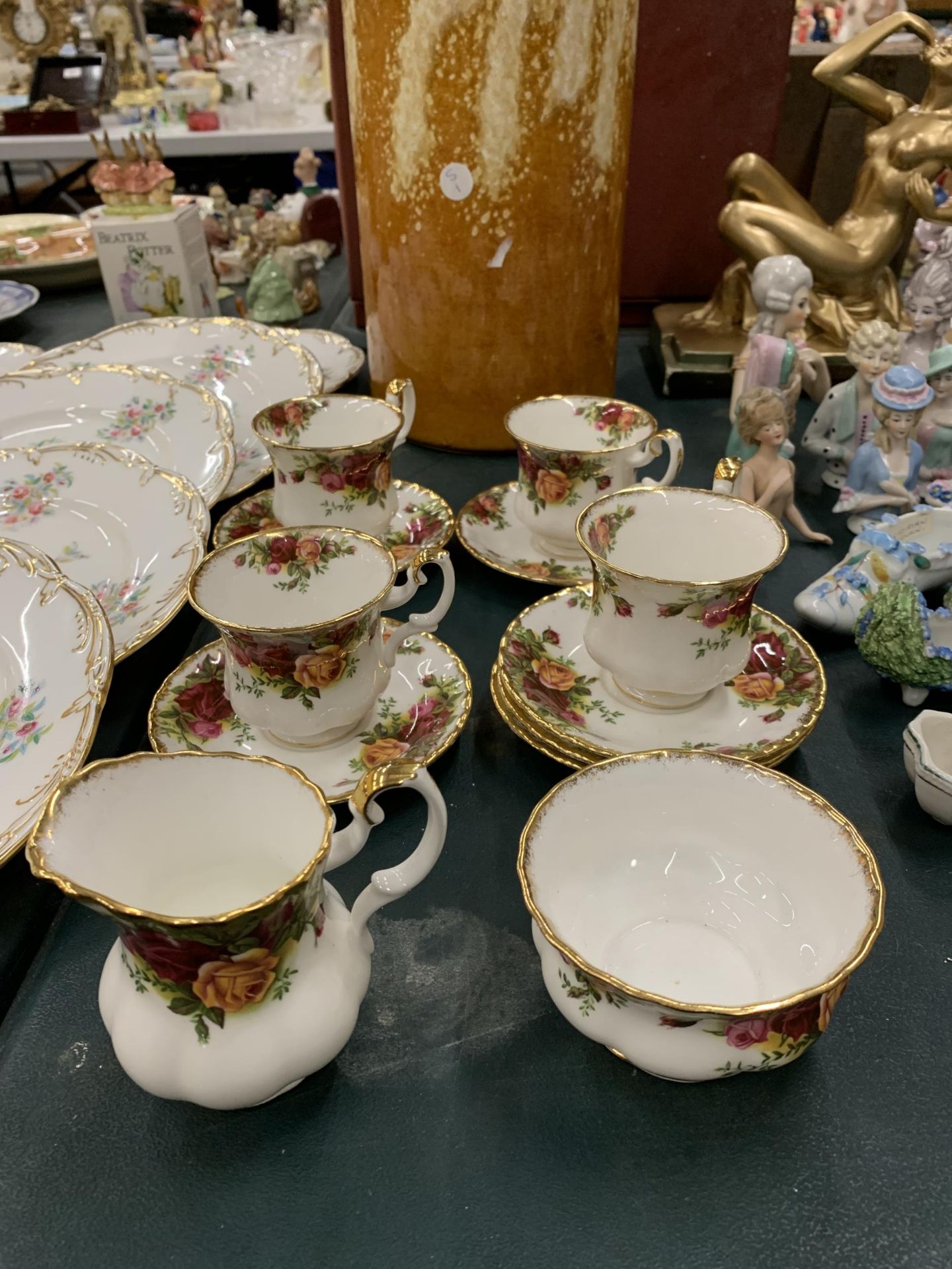 A QUANTITY OF ROYAL ALBERT 'OLD COUNTRY ROSES' TO INCLUDE CUPS, SAUCERS, SUGAR BOWL AND CREAM JUG