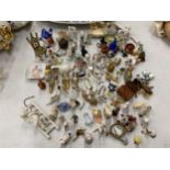 A LARGE QUANTITY OF MINIATURE CERAMIC ITEMS TO INCLUDE ANIMALS, BIRDS, FIGURES, JUGS, SHOES, ETC