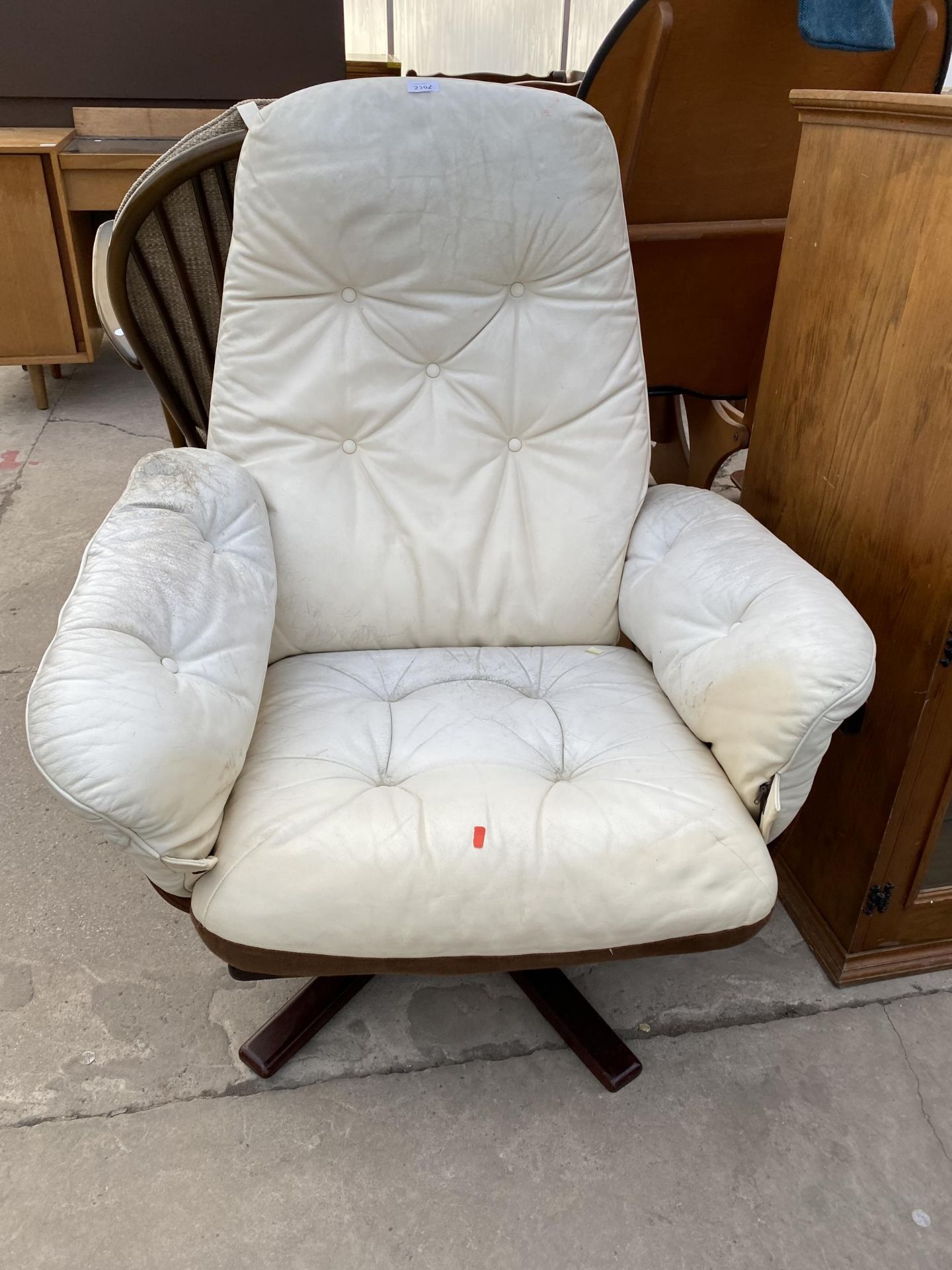 A 'MOEBEL' SWIVEL RECLINER CHAIR ON BENTWOOD FRAME