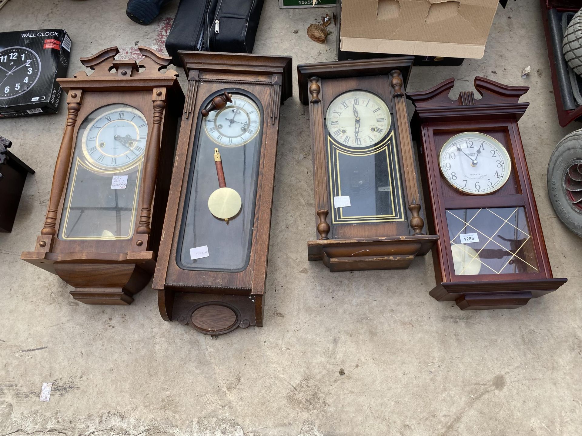 FOUR VARIOUS VIENNA STYLE WALL CLOCKS