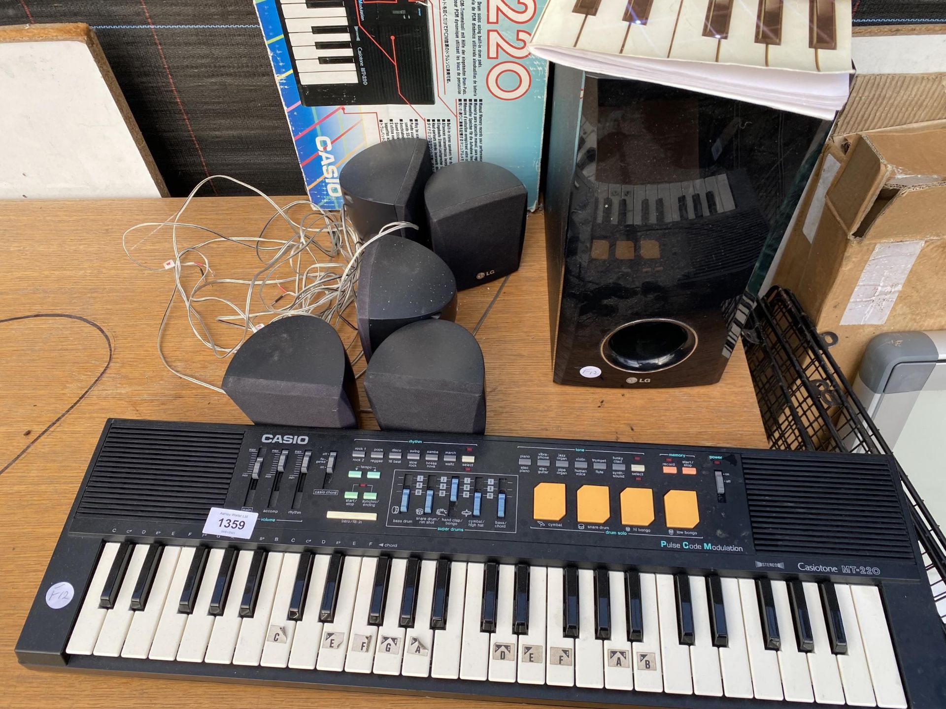 A CASIO CASIOTONE MT-220 KEYBOARD AND A LG SPEAKER SYSTEM - Image 2 of 2