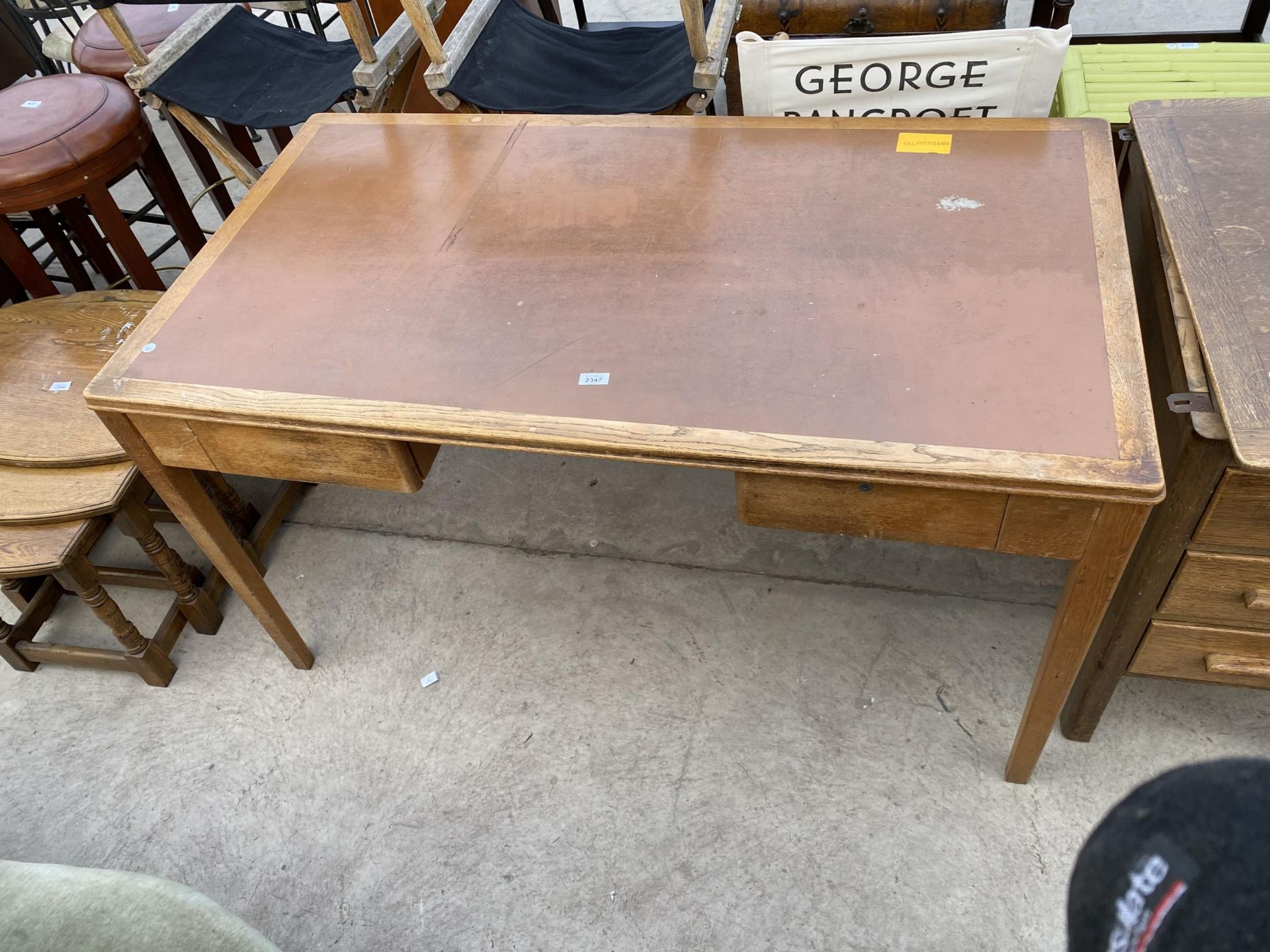 AN OAK EX.WD. (ENHAM 1958), OAK OFFICE SIDE TABLE WITH TWO DRAWERS, 54X30"