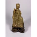 AN ORIENTAL JADE STYLE FIGURE, HEIGHT 16CM