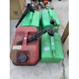 THREE PLASTIC FUEL CANS AND A FURTHER METAL FUEL CAN