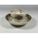 A 19TH CENTURY NEW HALL HAND PAINTED PORCELAIN TEA BOWL AND SAUCER