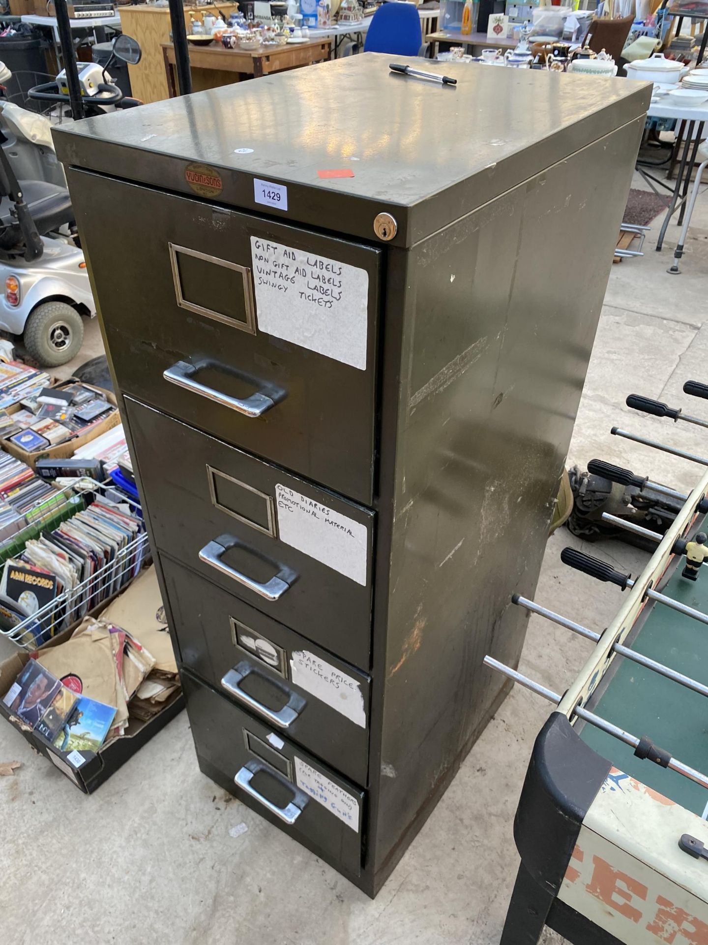 A VINTAGE YUGIN & SONS FOUR DRAWER FILING CABINET