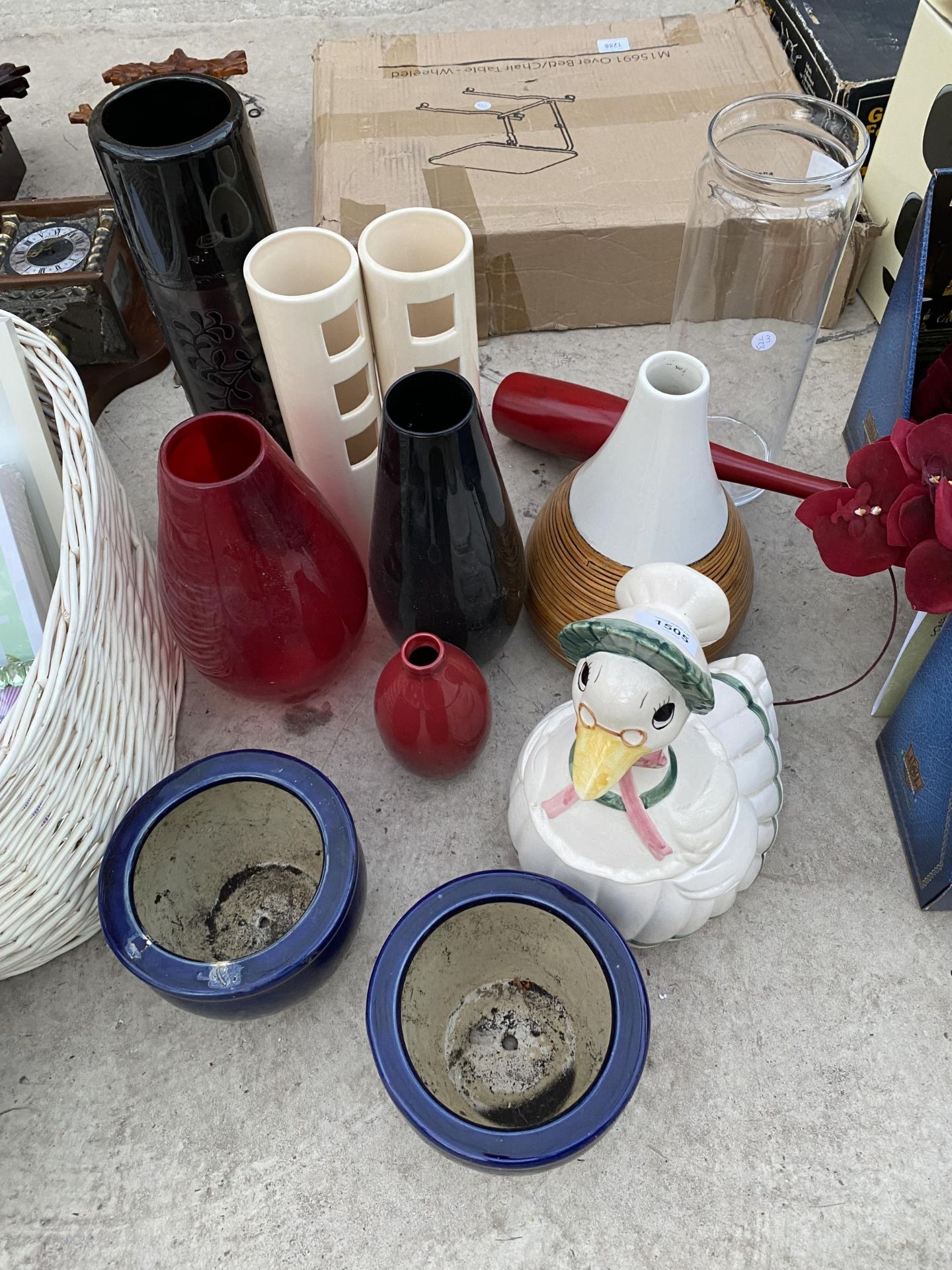 AN ASSORTMENT OF GLASS AND CERAMIC PLANTERS AND VASES