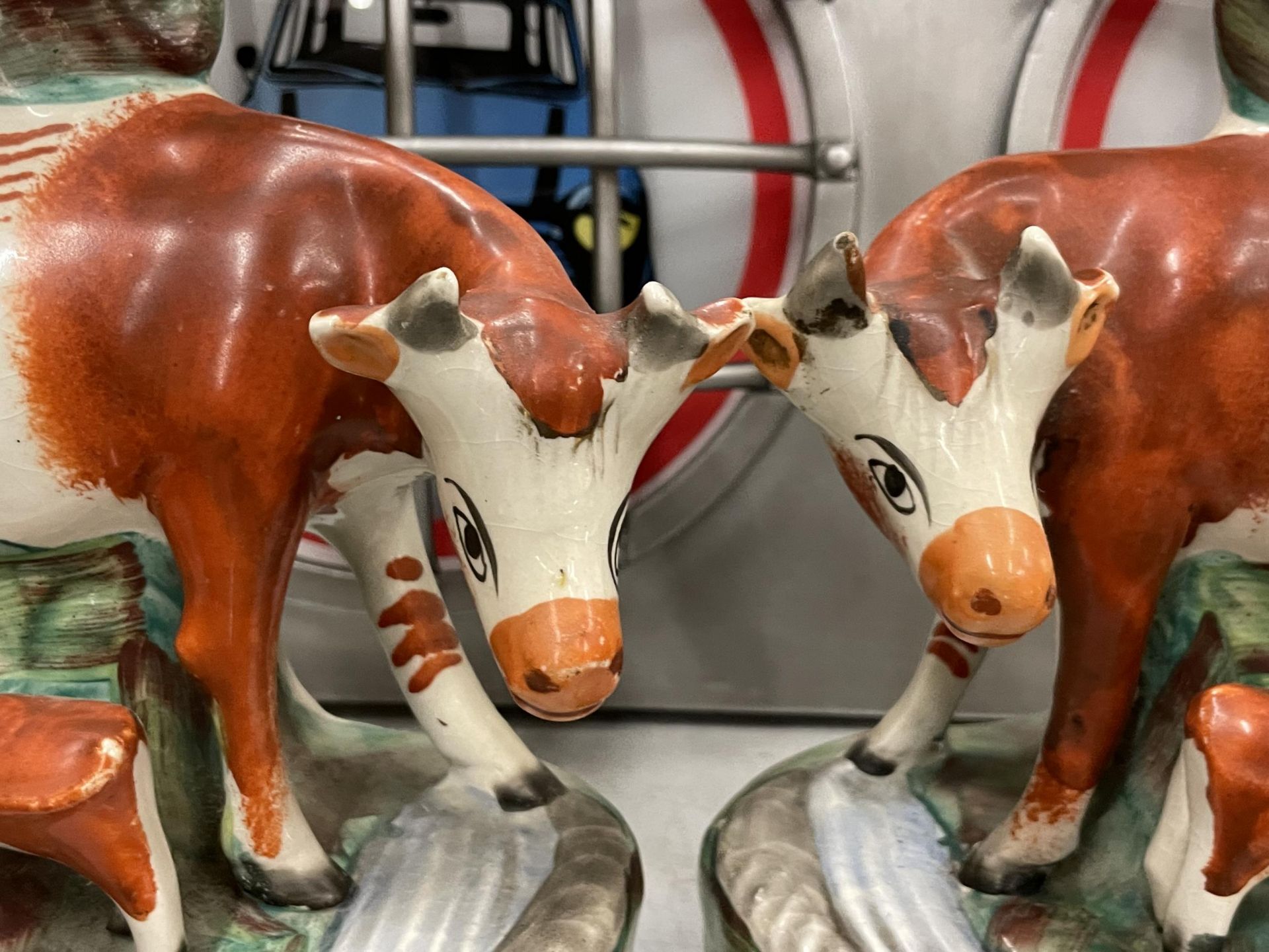 A PAIR OF 19TH CENTURY STAFFORDSHIRE POTTERY COW SPILL VASES - Image 3 of 3