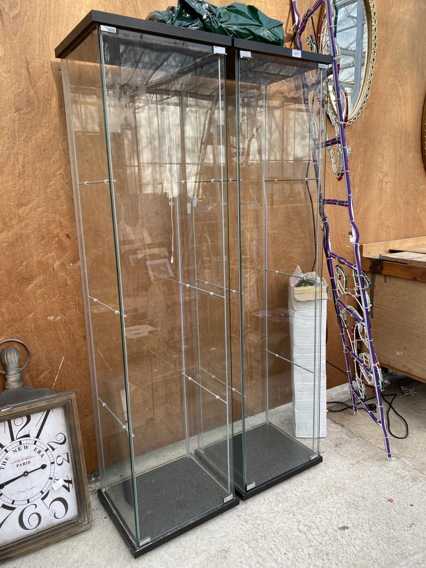 A PAIR OF GLASS DISPLAY CABINETS COMPLETE WITH THREE GLASS SHELVES EACH