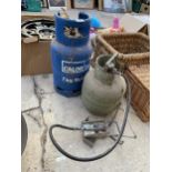 A VINTAGE GAS BURNER AND TWO GAS BOTTLES