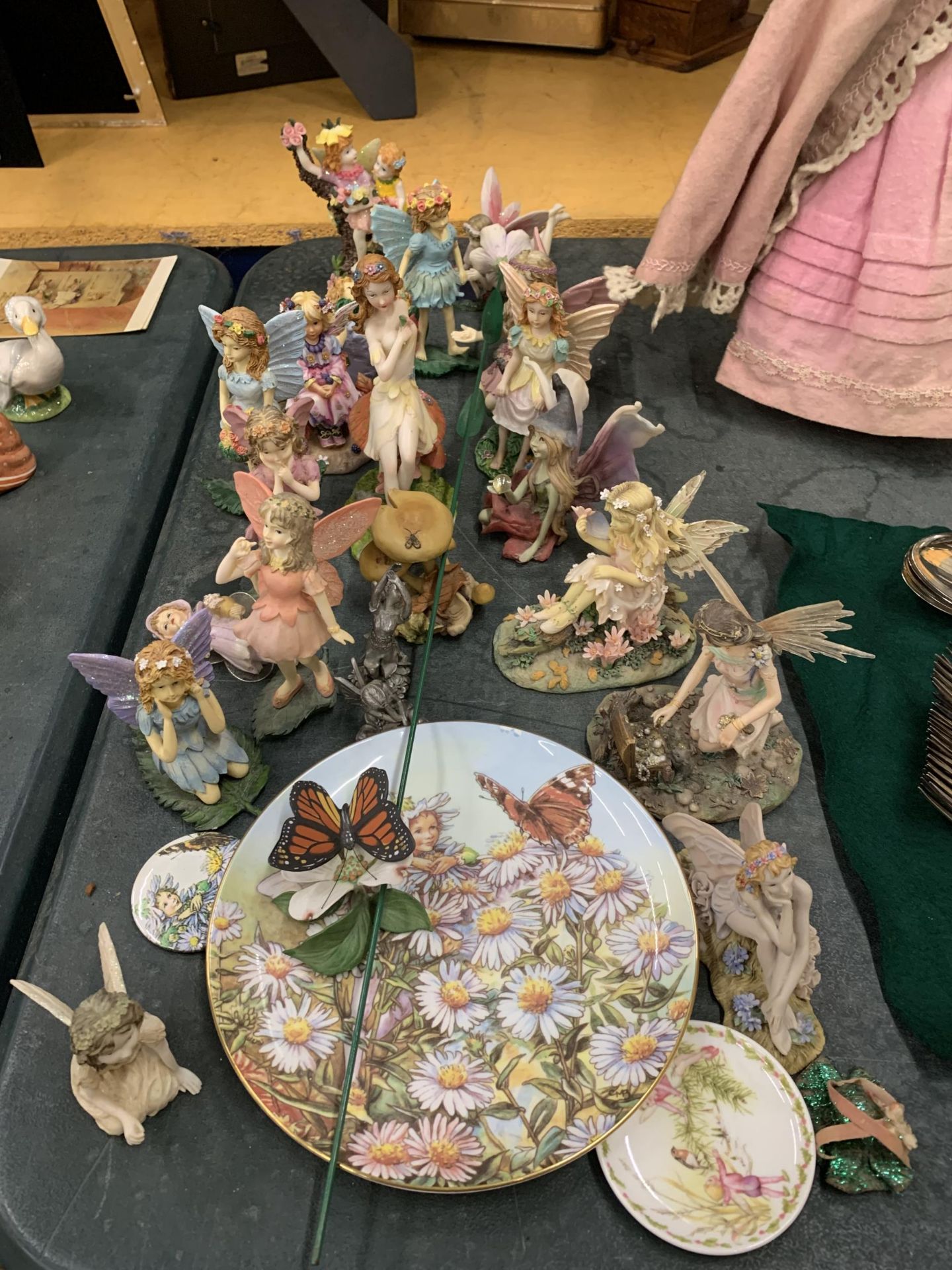 A LARGE COLLECTION OF CERAMIC AND RESIN FAIRY FIGURES, ETC