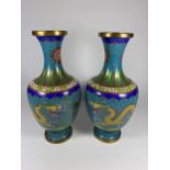 A PAIR OF CHINESE CLOISONNE BALUSTER FORM VASES WITH FIVE CLAW DRAGON CHASING THE FLAMING PEARL