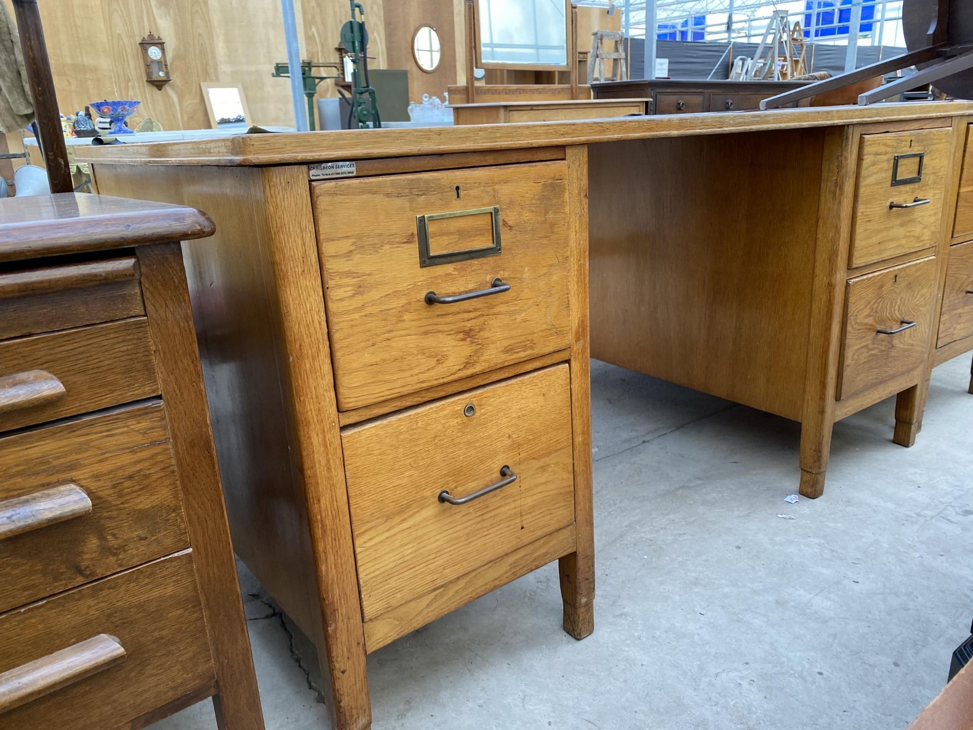 AN OAK TWIN PEDESTAL DESK WITH INSET LEATHERETTE TOP, 60X36" - Image 2 of 5