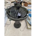 A PLASTIC ELECTRIC GARDEN WATER FEATURE