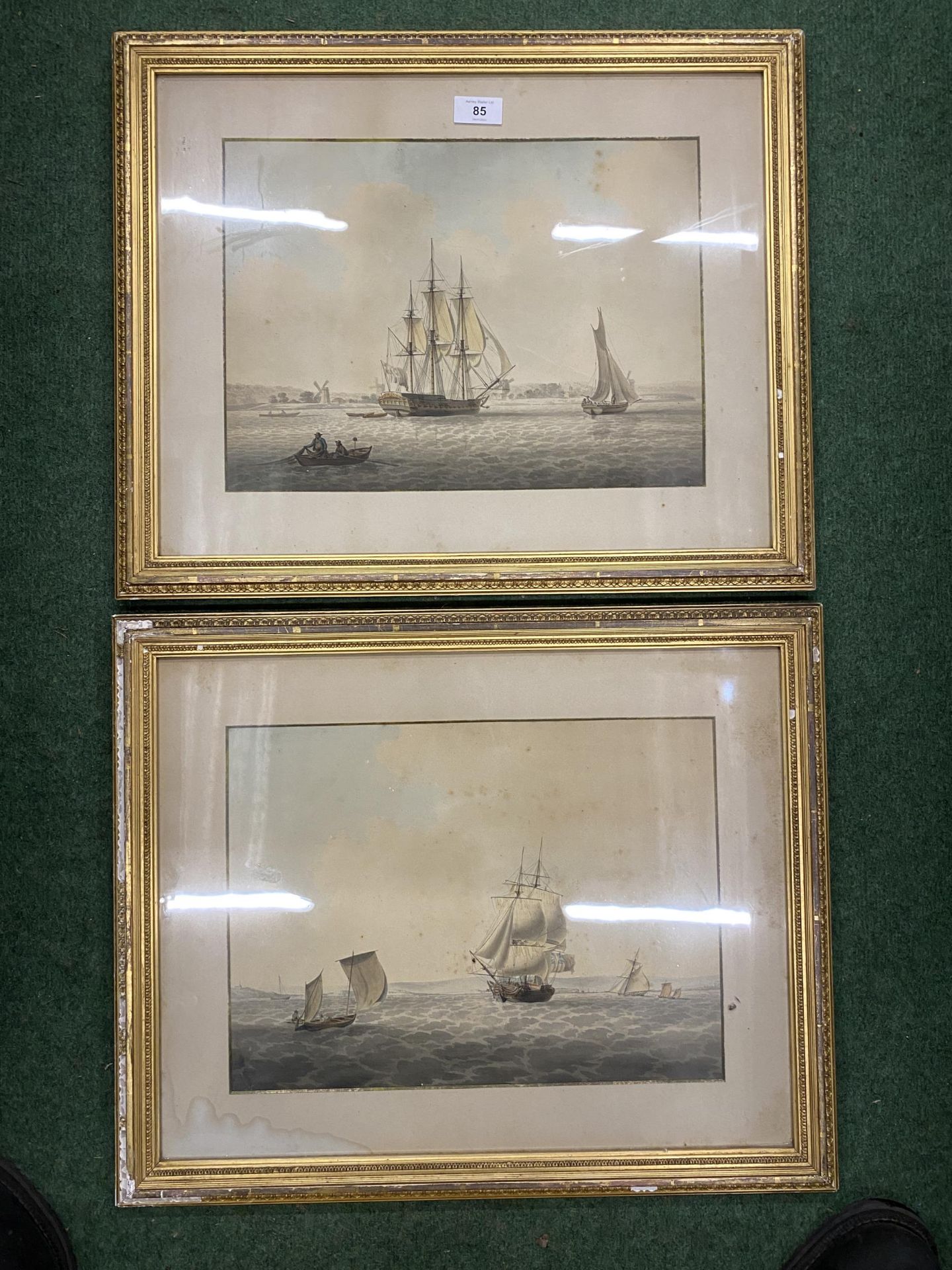 A PAIR OF 19TH CENTURY GILT FRAMED MARITIME / NAVAL WATERCOLOURS OF SAILING VESSELS, BOTH WITH