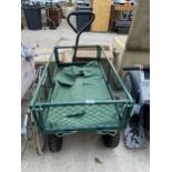 A GREEN METAL FOUR WHEELED MARKET GARDENERS TROLLEY