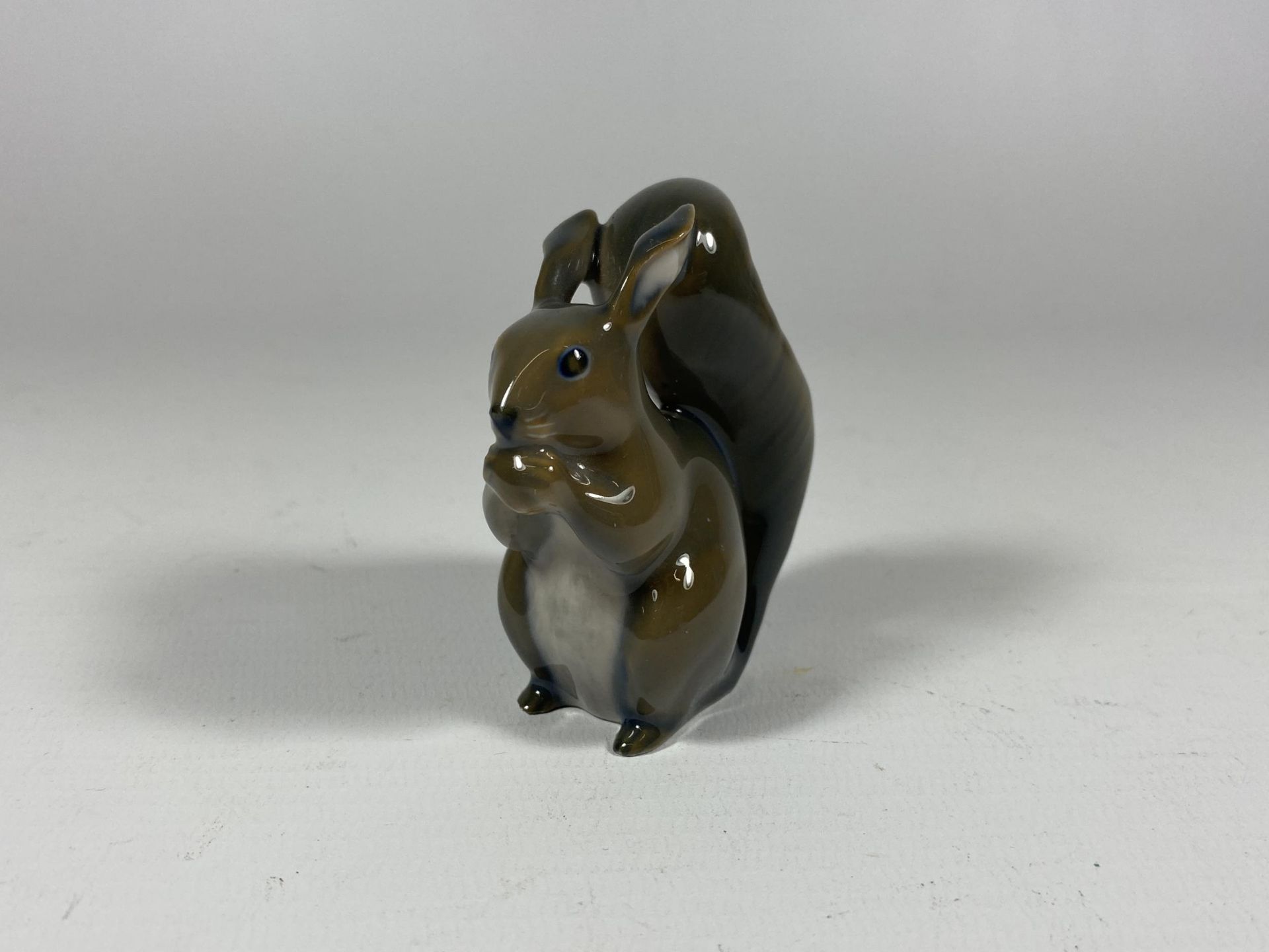 A ROYAL COPENHAGEN SMALL MODEL OF A SQUIRREL