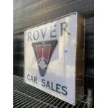 AN ILLUMINATED 'ROVER' SIGN