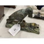 A CAST METAL WOODPECKER DOOR KNOCKER MODEL