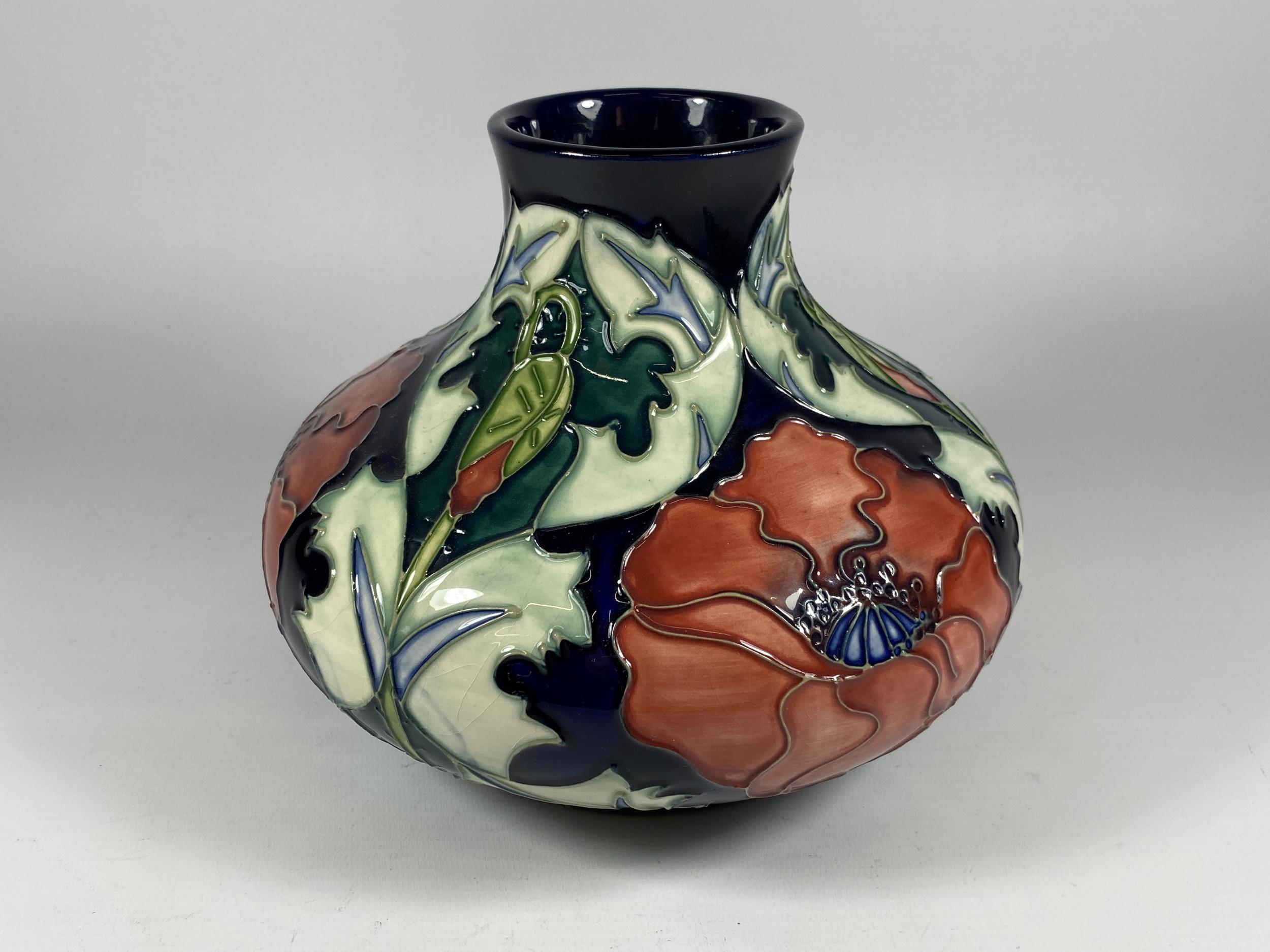 A MOORCROFT POPPY PATTERN SQUAT VASE DESIGNED BY RACHEL BISHOP, DATED 1996, HEIGHT 18CM, (SECONDS)