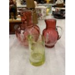 THREE PIECES OF MARY GREGORY STYLE JUGS TO INCLUDE TWO CRANBERRY AND ONE LEMON COLOURED