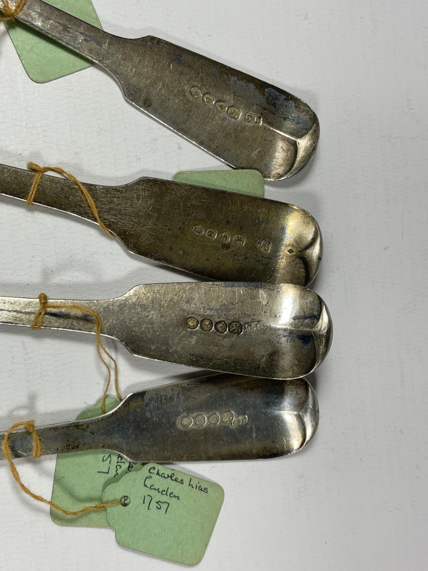 FOUR GEORGIAN SILVER TABLESPOONS COMPRISING THREE GEORGE II, CHARLES LIAS EXAMPLES WITH HALLMARKS - Image 2 of 2