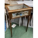 AN OAK JEWELLERY DISPLAY CABINET / SIDE TABLE WITH VARIOUS EMBROIDERY CONTENTS